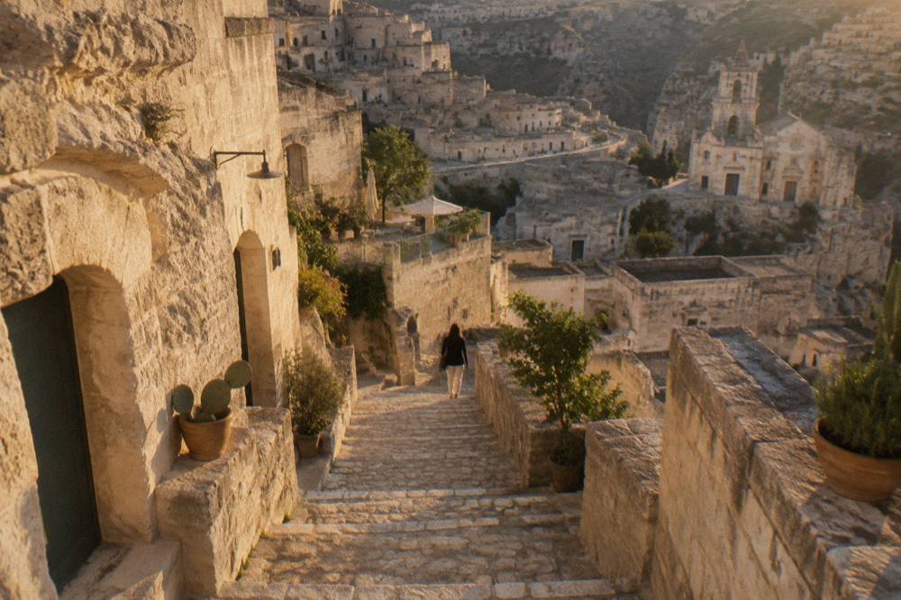 Narrow stone stairway between cave houses in the Sassi districts of Matera