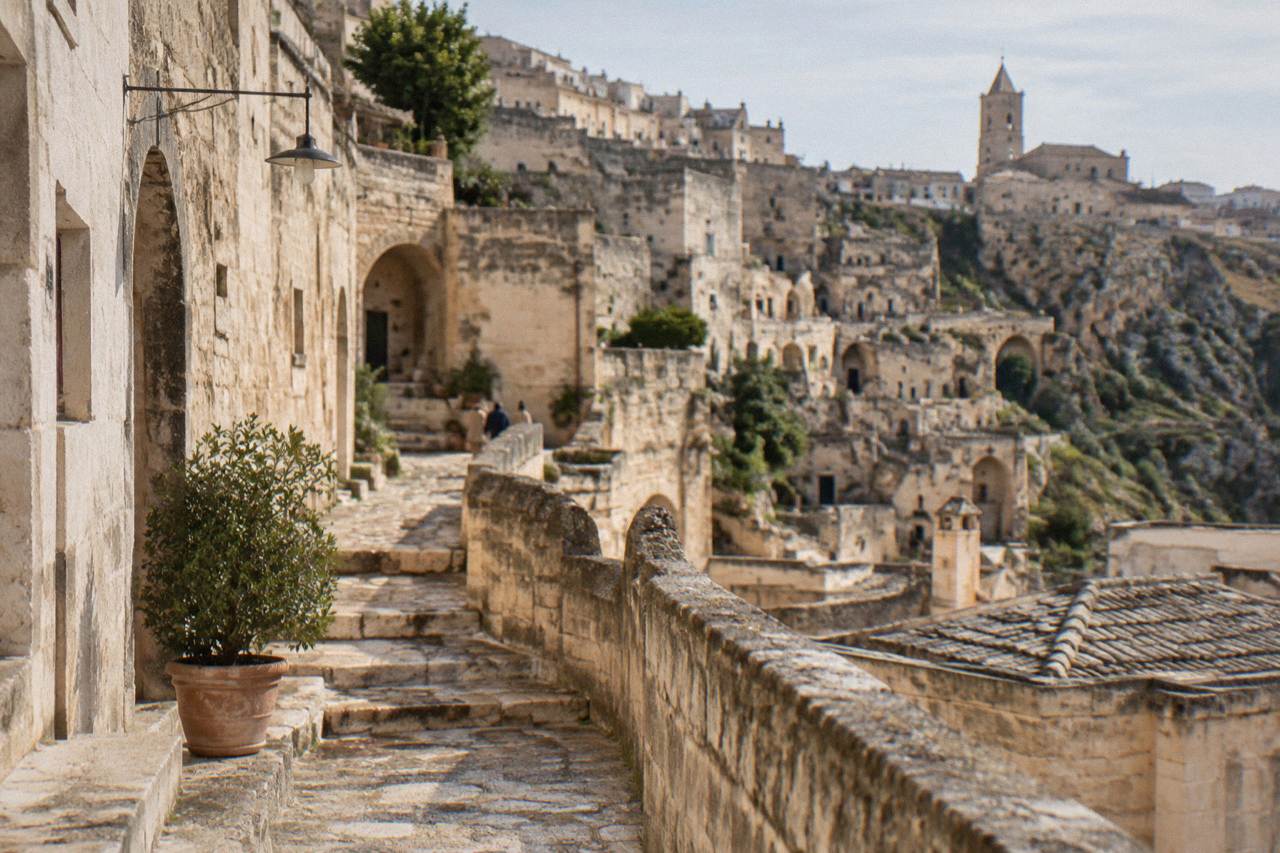 Stone buildings and cave facades of Sasso Barisano rising above the rooftops of Matera