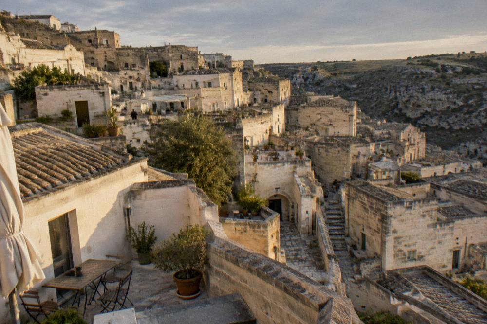Rooftop terraces of Sasso Barisano seen from above at dusk