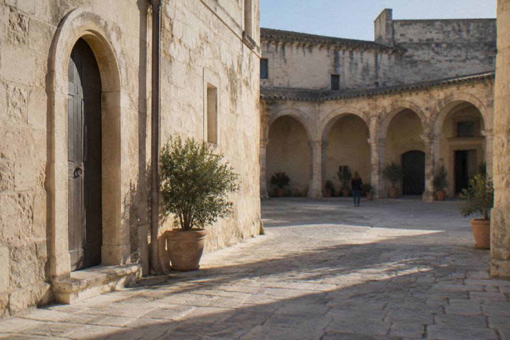 A closed museum entrance in an Italian town with a notice beside the door