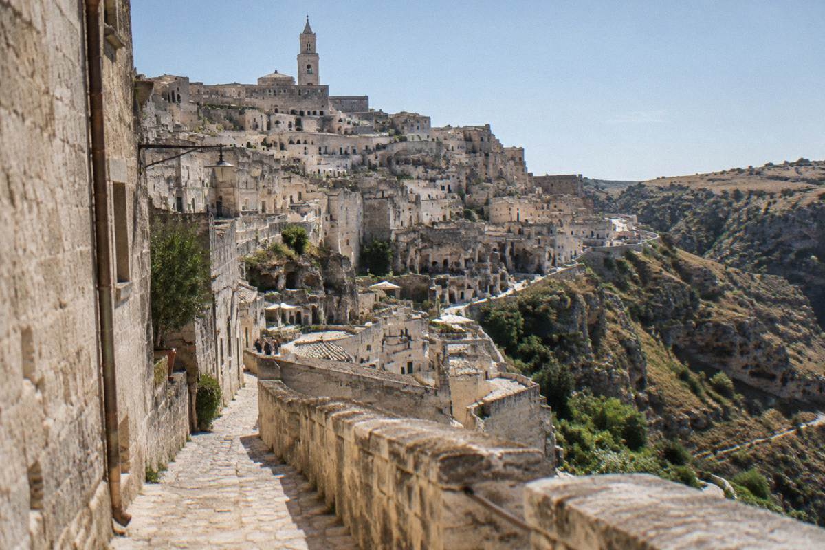 Cave dwellings and stone houses of Sasso Caveoso climbing a steep slope above the gorge