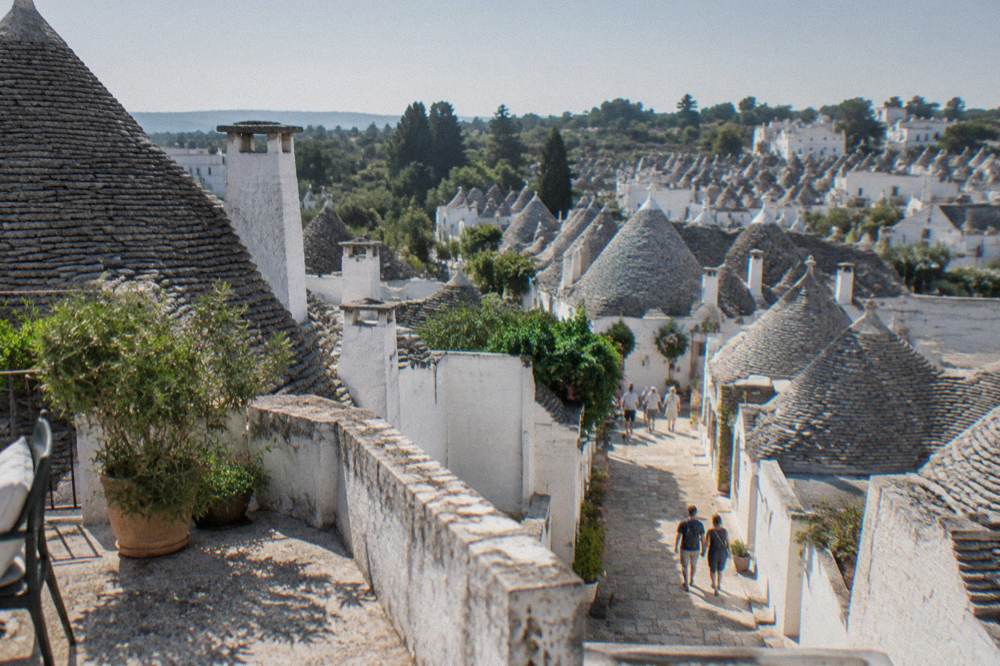 The hillside of Rione Monti in Alberobello seen from a rooftop terrace