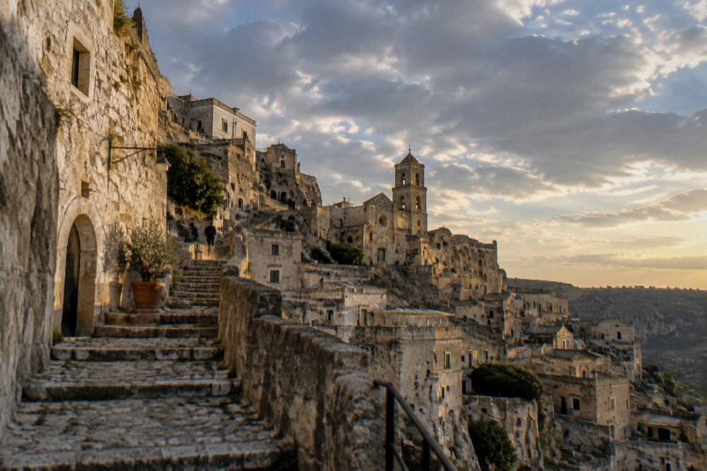 Cave dwellings and stone houses of the Matera Sassi at dusk