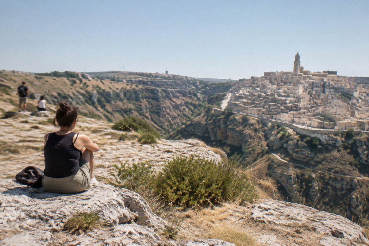 The pale cave dwellings of the Sassi of Matera rising above the Gravina canyon
