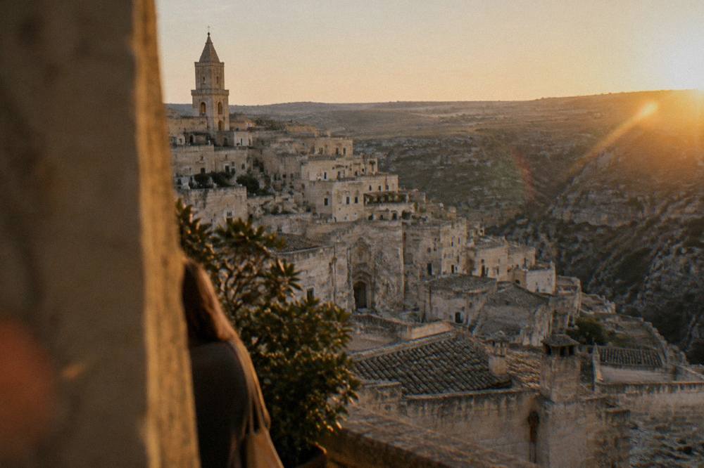 Evening light over the rooftops of the Sassi in Matera with the Murgia plateau beyond