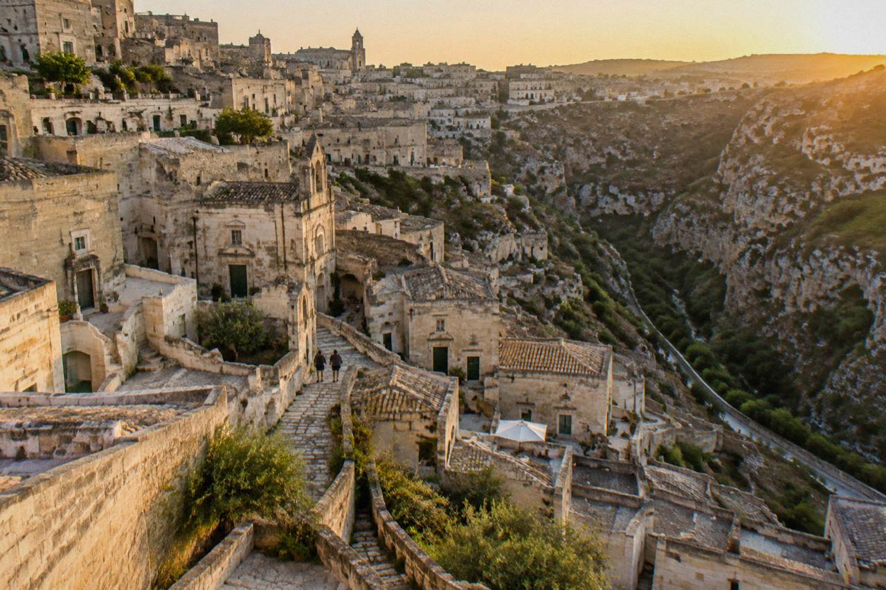 View over the cave dwellings of the Sassi districts in Matera at golden hour