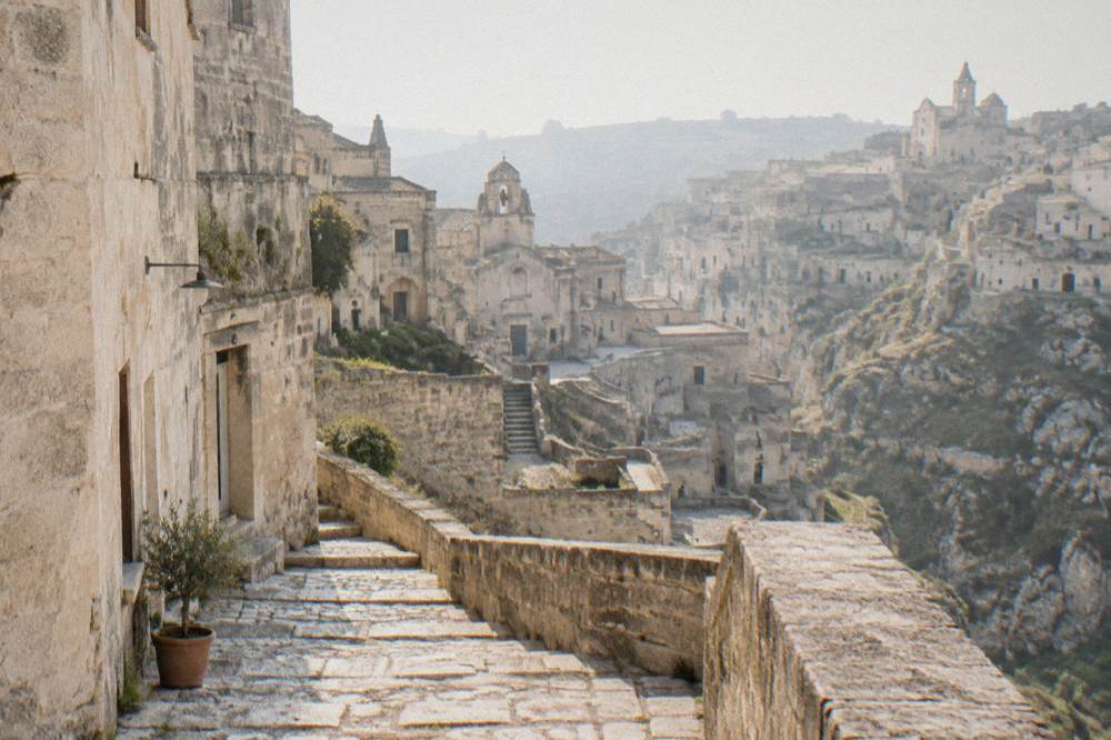 Empty stone stairway in the Sassi of Matera in soft morning light