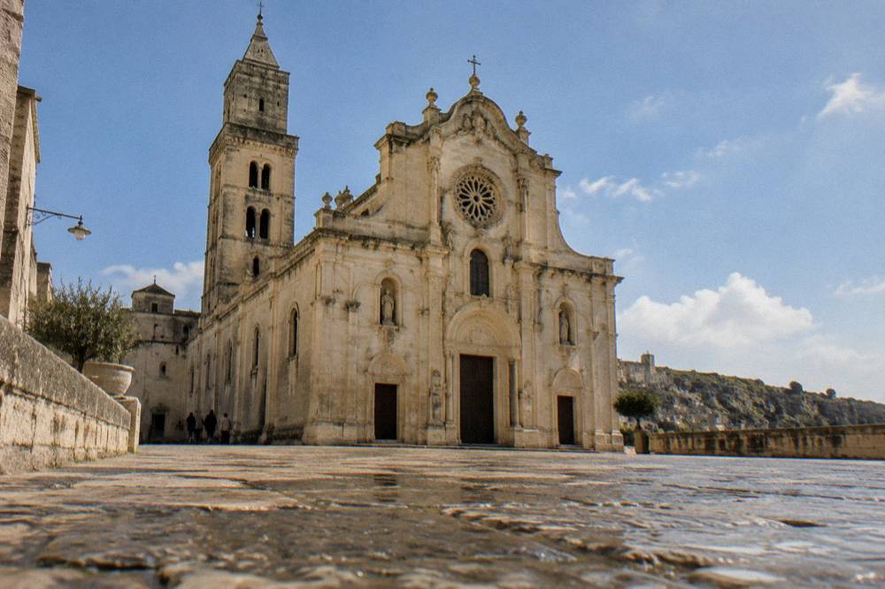 The baroque facade of Matera Cathedral on the Civita high ground above the Sassi
