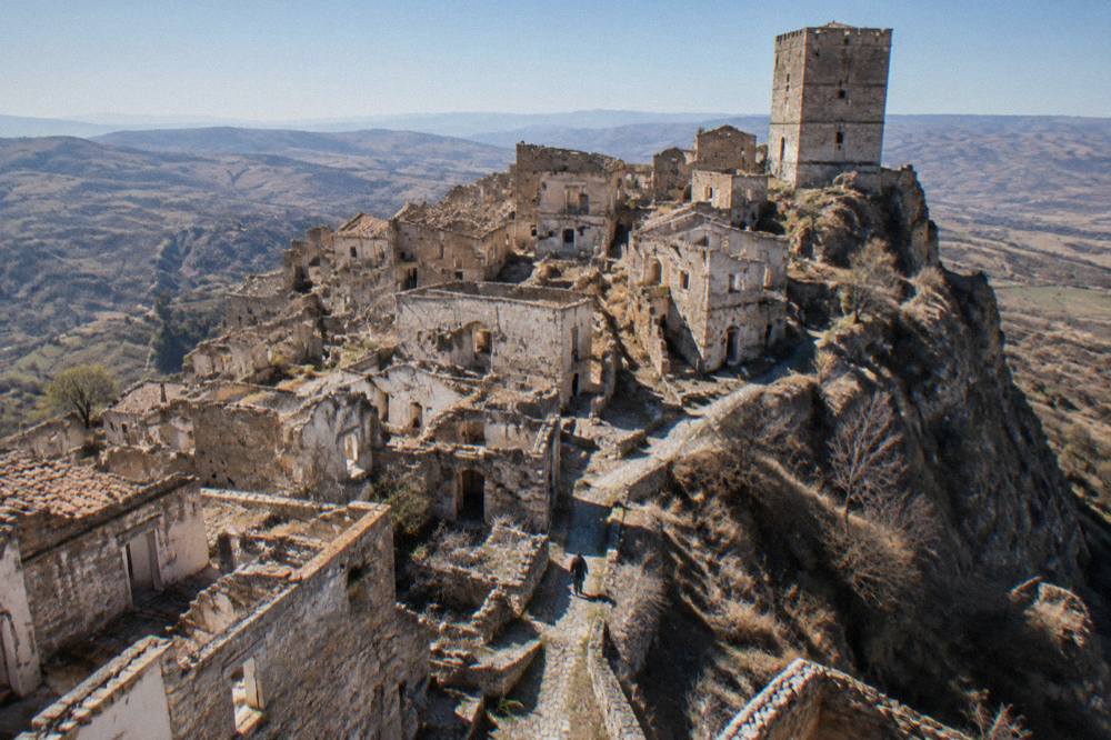 The abandoned stone houses of the ghost town Craco on a clear winter morning