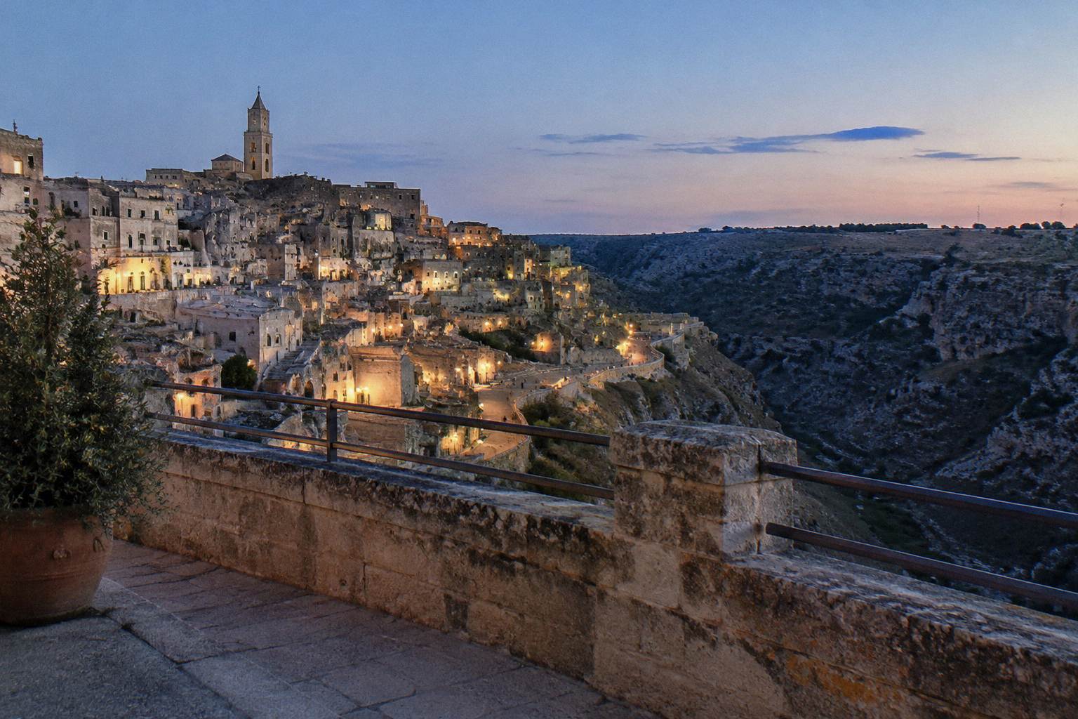 Terrace viewpoint over the Sassi and the gorge at blue hour