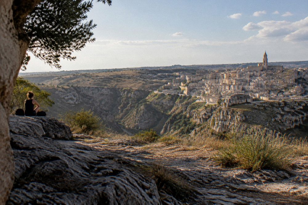 Dry limestone gorge of the Gravina canyon with the Murgia plateau on the far side