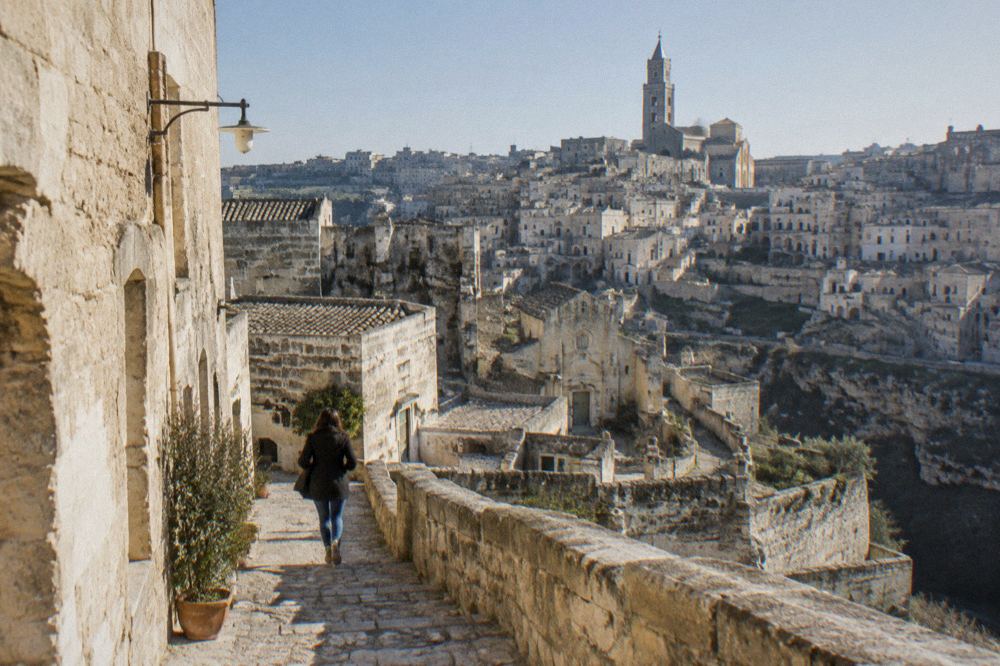 The rooftops of Matera under a cold winter sky with the cathedral tower visible