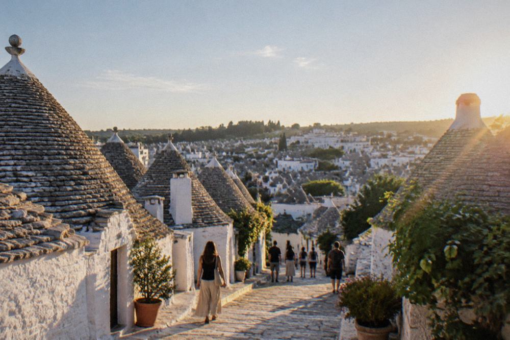 Conical trulli rooftops of Alberobello seen from above the town