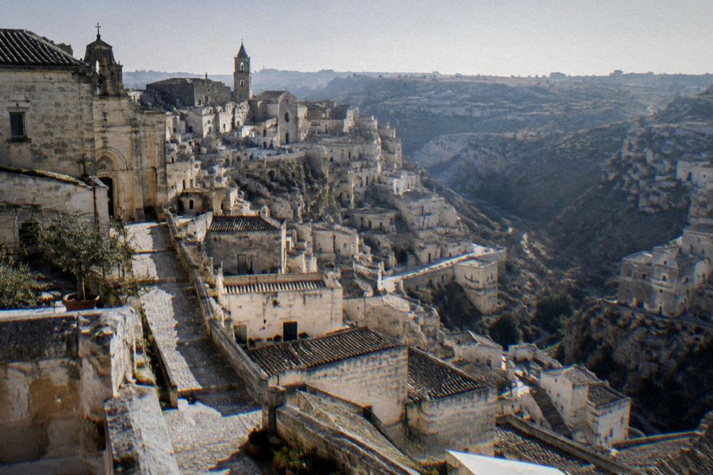 Crowd-free morning view over the Sassi rooftops of Matera in soft early light