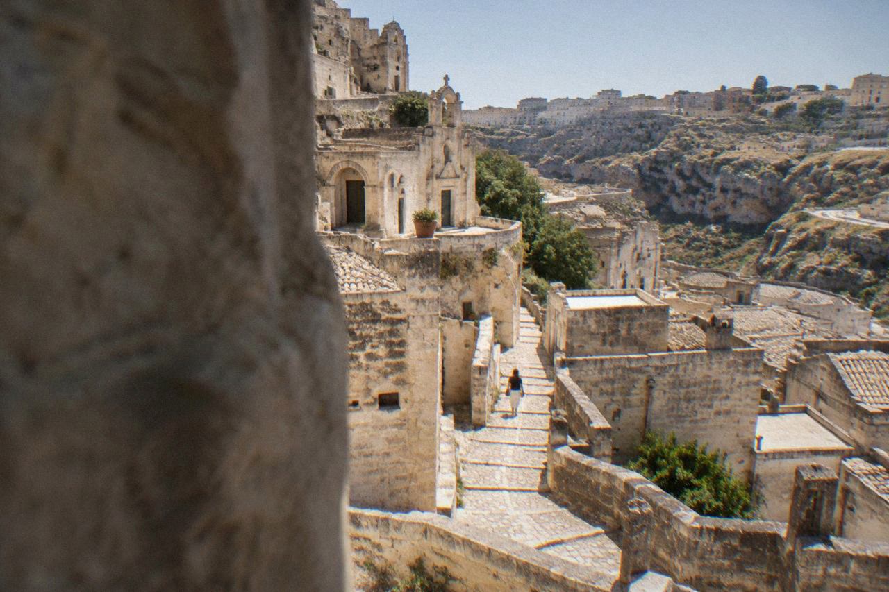Stone stairways and cave dwellings of the Sassi districts in Matera under a clear sky
