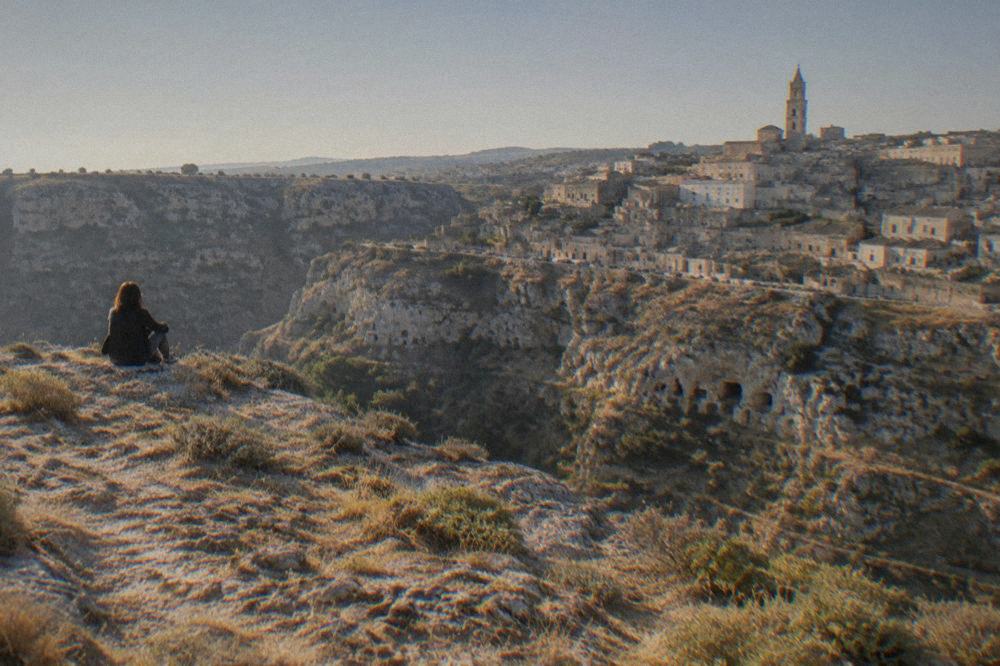 The rock face of the Gravina canyon opposite the Sassi with cave church openings visible